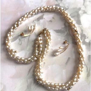 Solid 14K Gold Lustrous Cultured 3-Strand RicePearl Necklace with earring set.